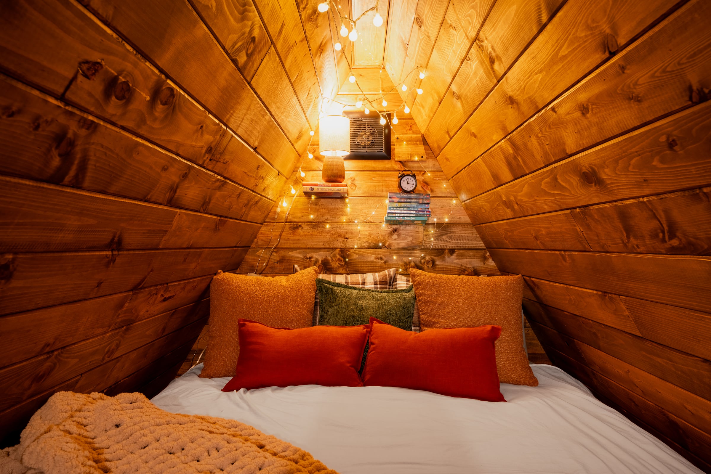 Attic bed with string lights